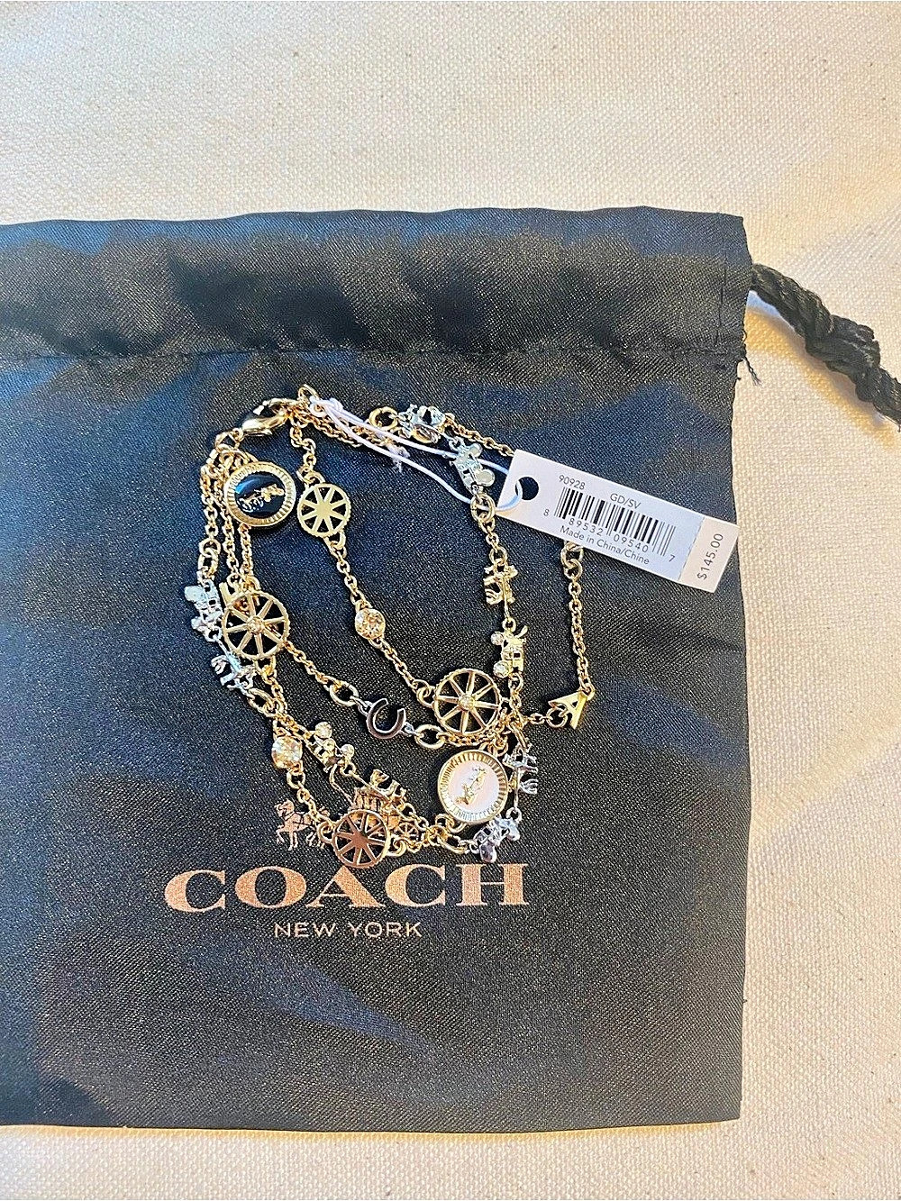 Coach Mixed-Metal Charm Bracelet